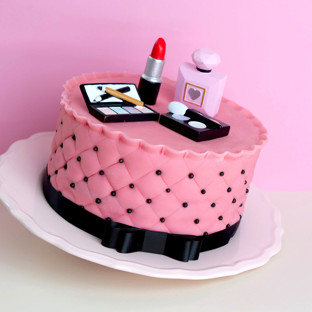 Gâteau Deluxe maquillage avec ruban noir