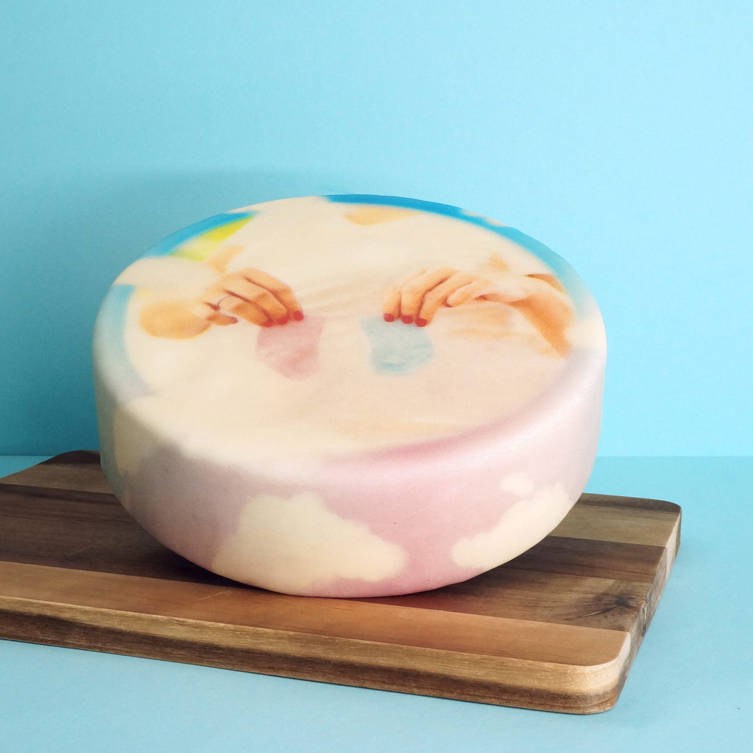 Gâteau photo doux nuages pour bébé rond