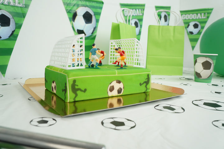 Joueurs de foot sur gâteau terrain 