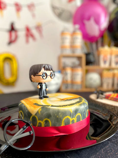 Harry Potter® sur gâteau Magique rouge