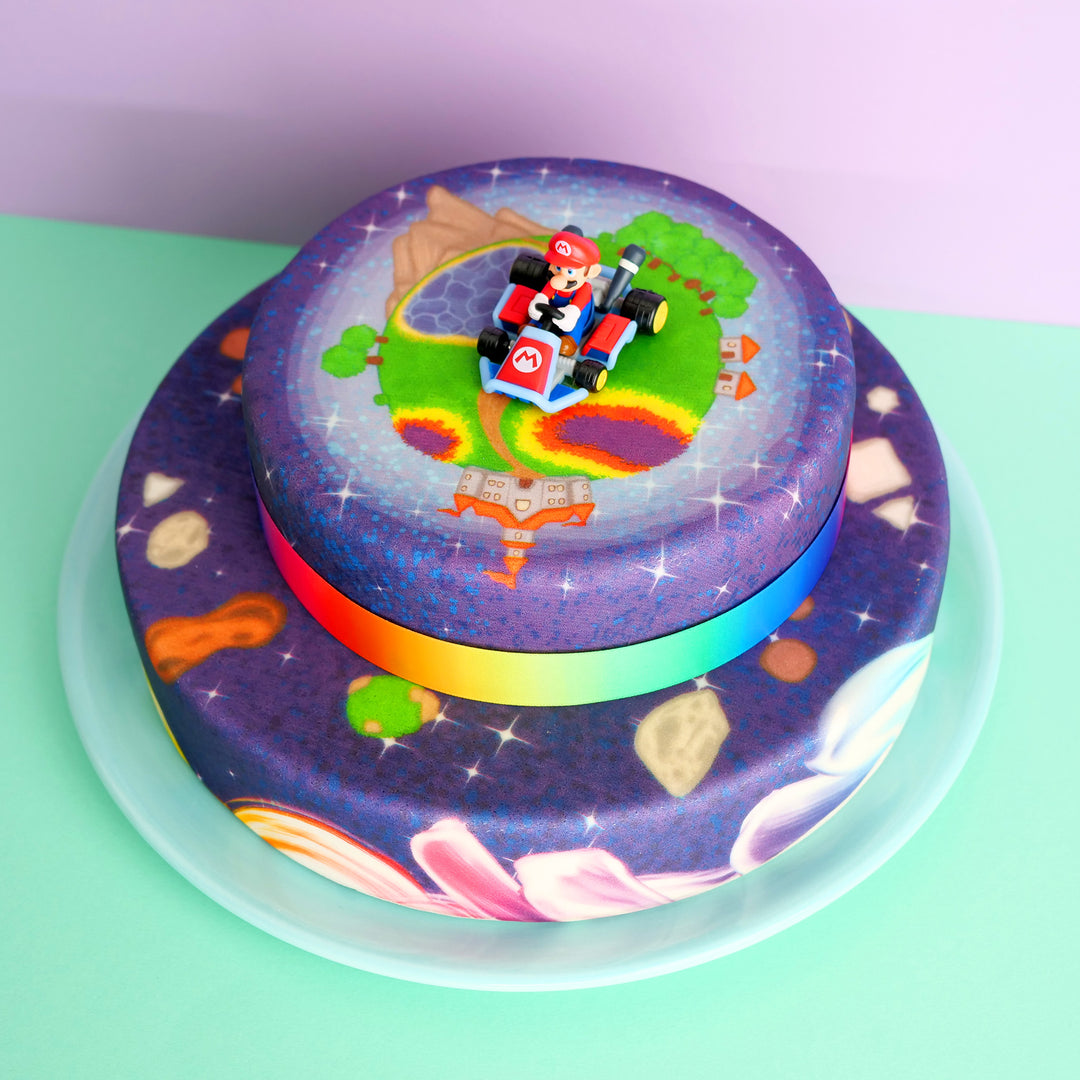 Mario Kart® sur gâteau planète peint à 2 étages