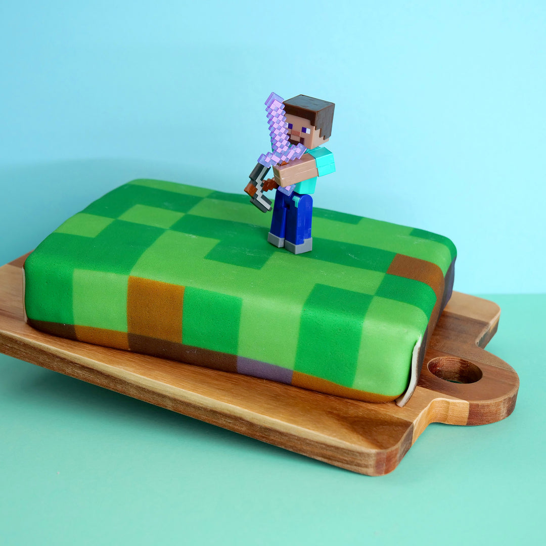 Figurine Minecraft® sur gâteau « monde des jeux »