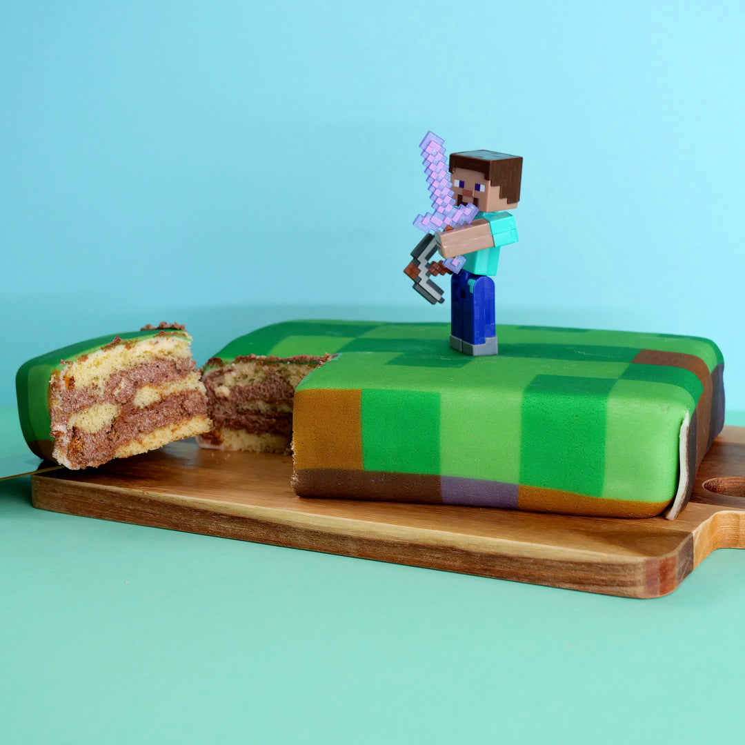 Figurine Minecraft® sur gâteau « monde des jeux »