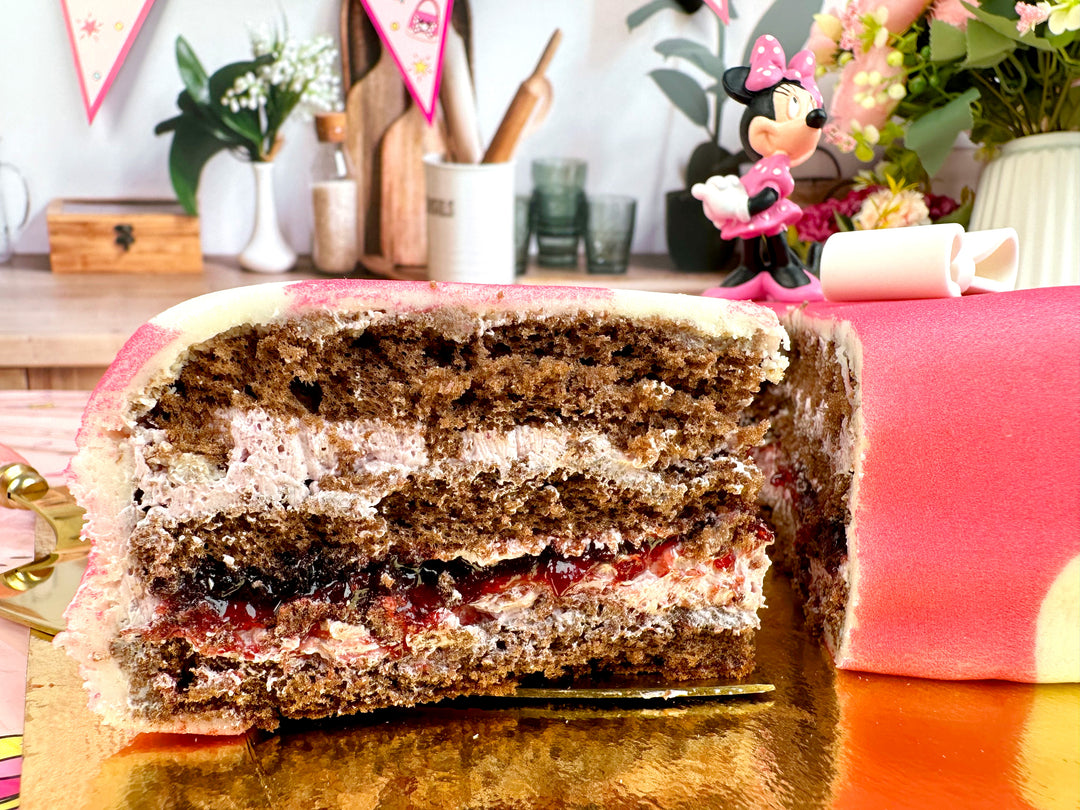Minnie® sur gâteau rose à pois