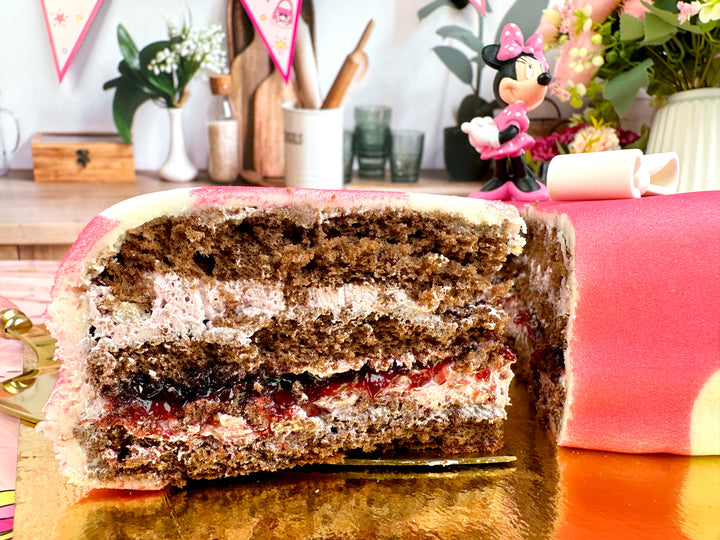 Minnie® sur gâteau rose à pois