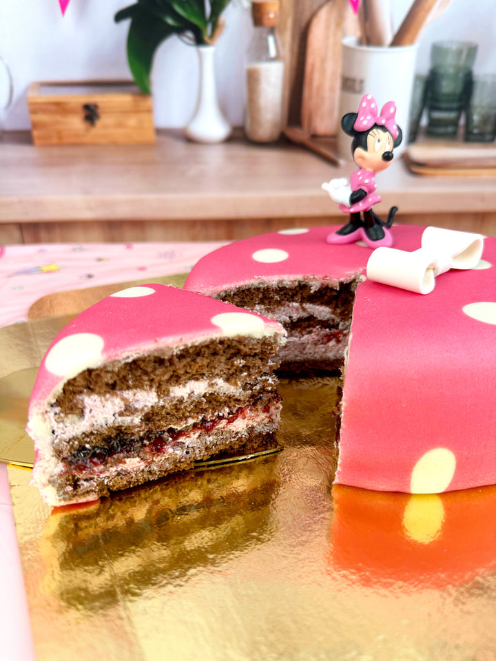 Minnie® sur gâteau rose à pois
