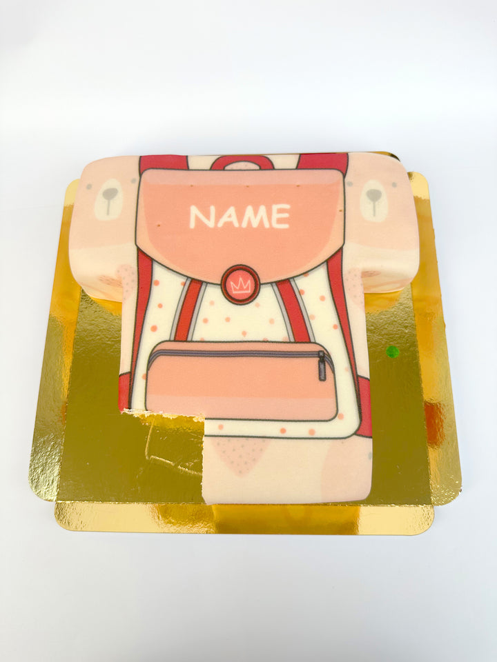 Gâteau sac d'école rose