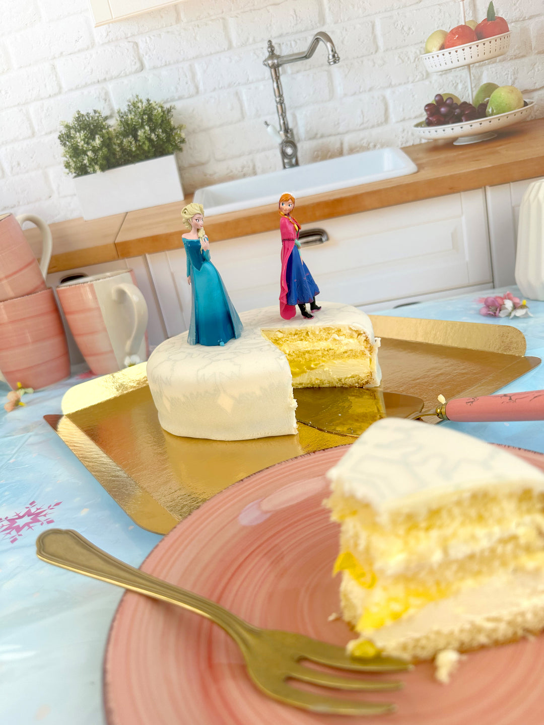 Gâteau figurines Anna & Elsa de la Reine des Neiges® 