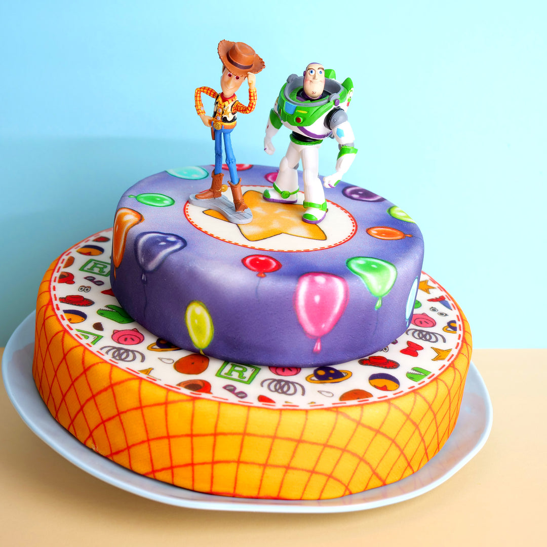 Cowboy Woody® & Buzz Lightyear® auf 2-stöckiger Spielzeug-Torte