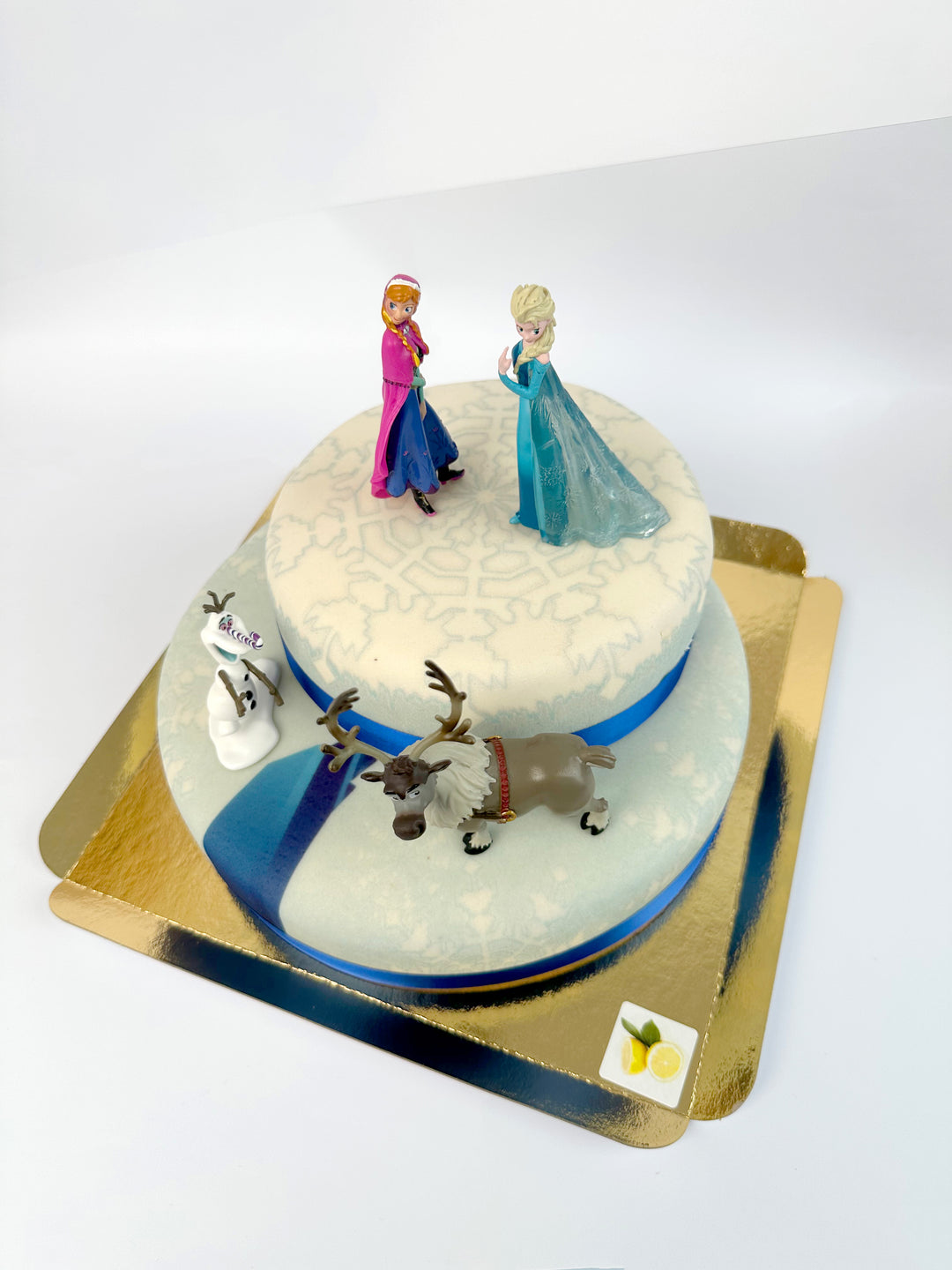 La Reine des Neiges® et ses compagnons sur gâteau