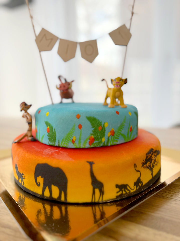 Simba®, Timon et Pumba® sur gâteau savane double-étage