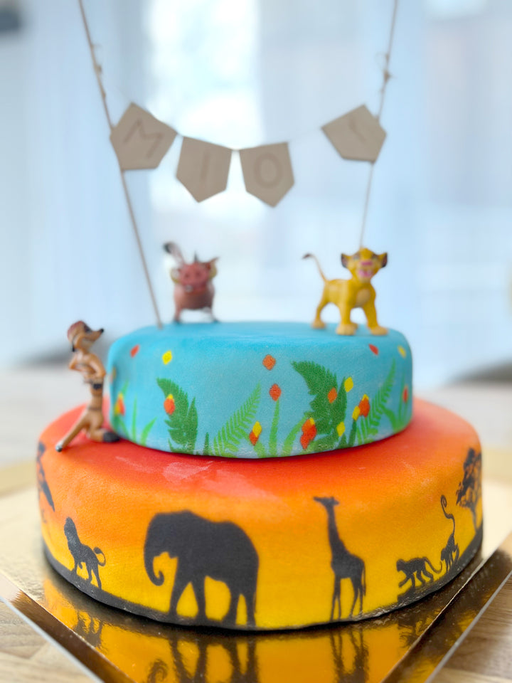 Simba®, Timon et Pumba® sur gâteau savane double-étage