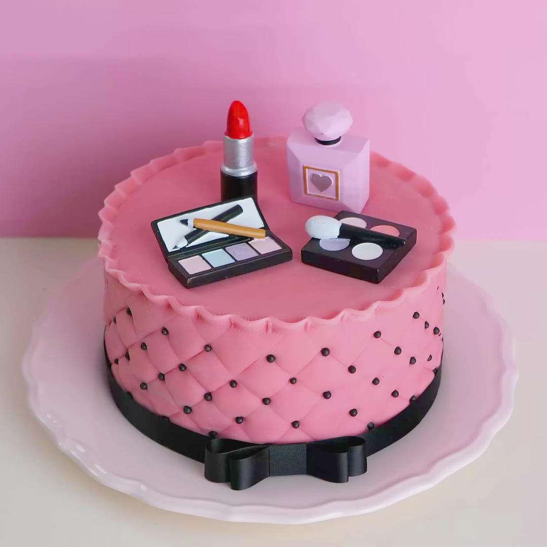 Gâteau Deluxe maquillage avec ruban noir