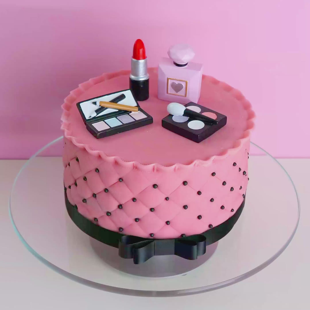 Gâteau Deluxe maquillage avec ruban noir