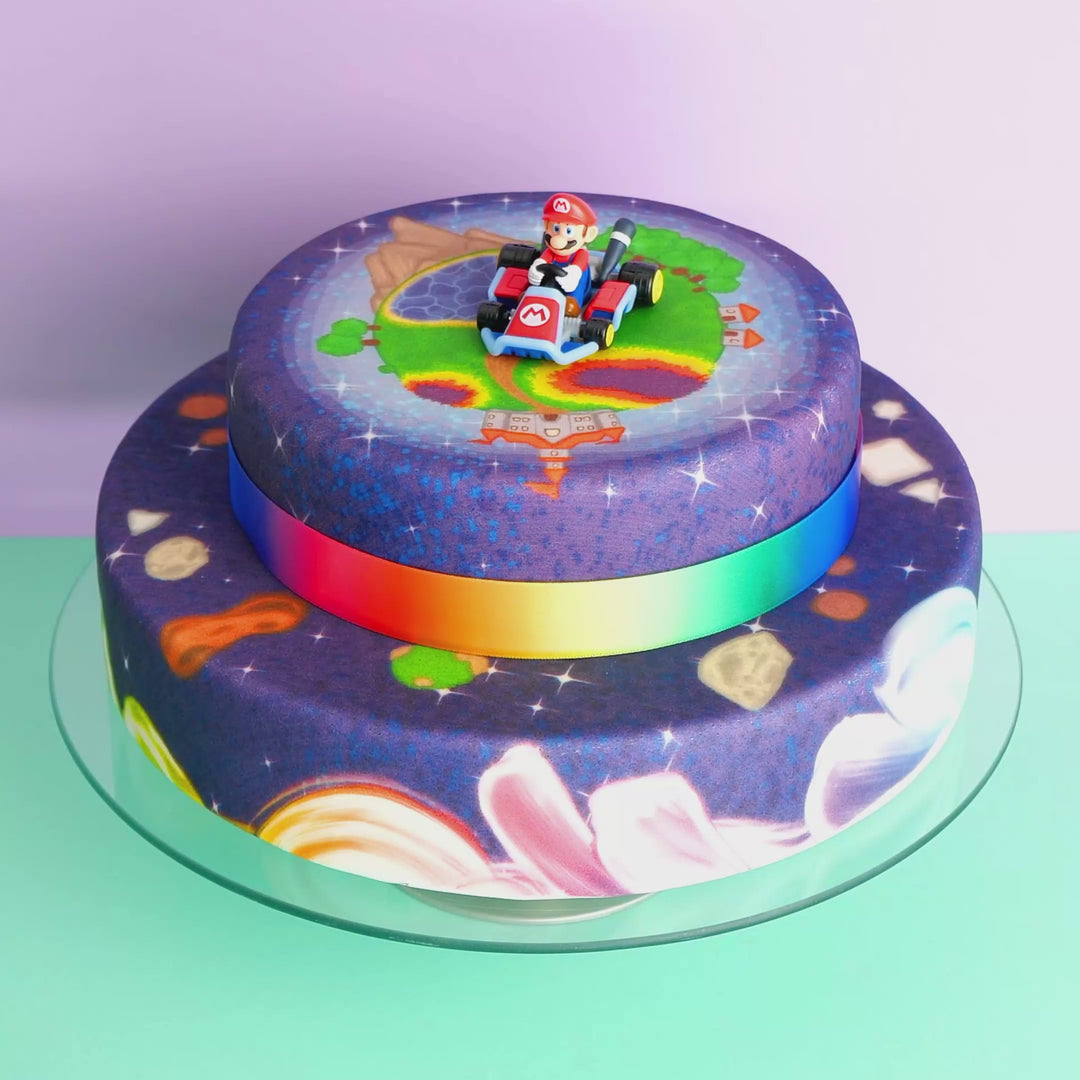 Mario Kart® sur gâteau planète peint à 2 étages