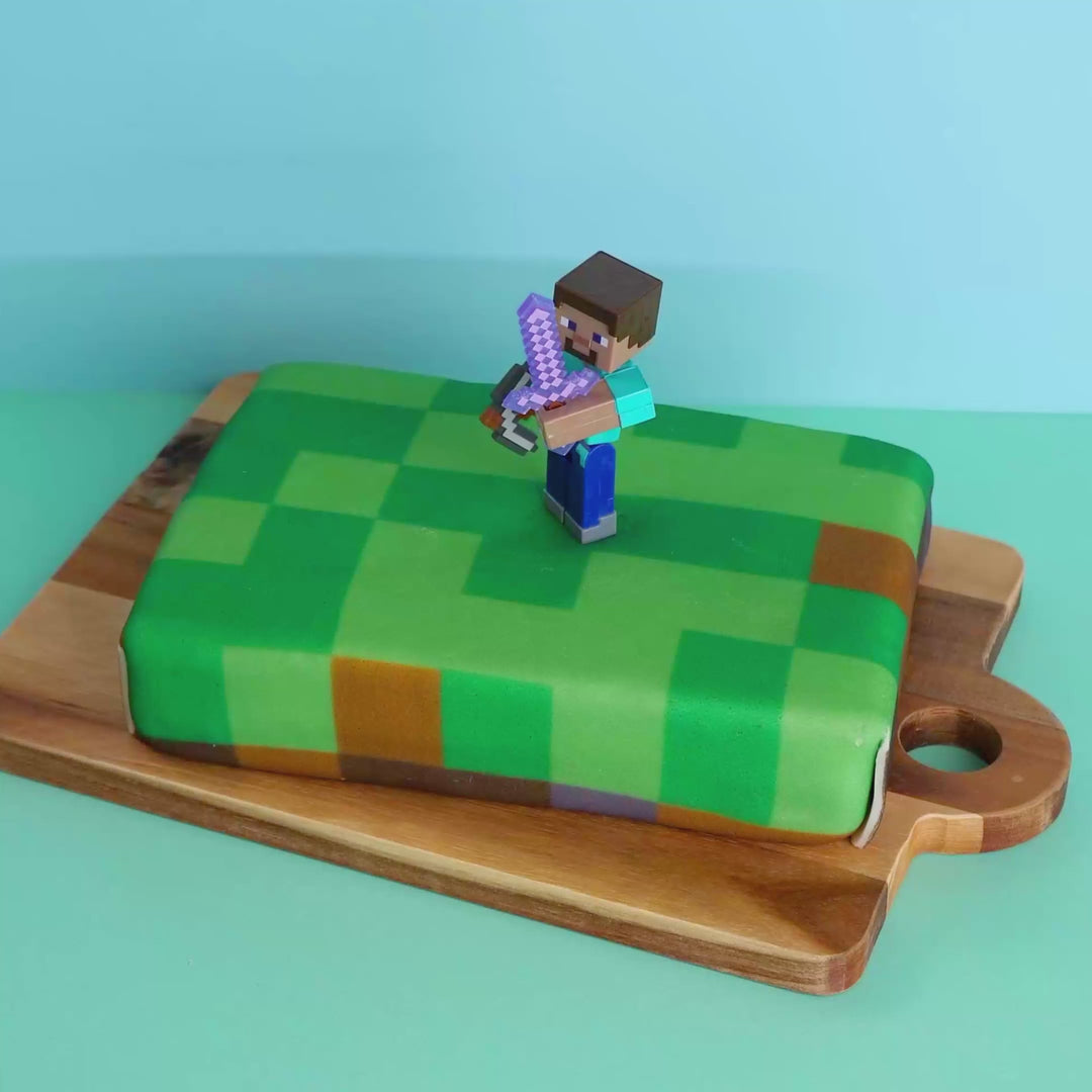 Figurine Minecraft® sur gâteau « monde des jeux »