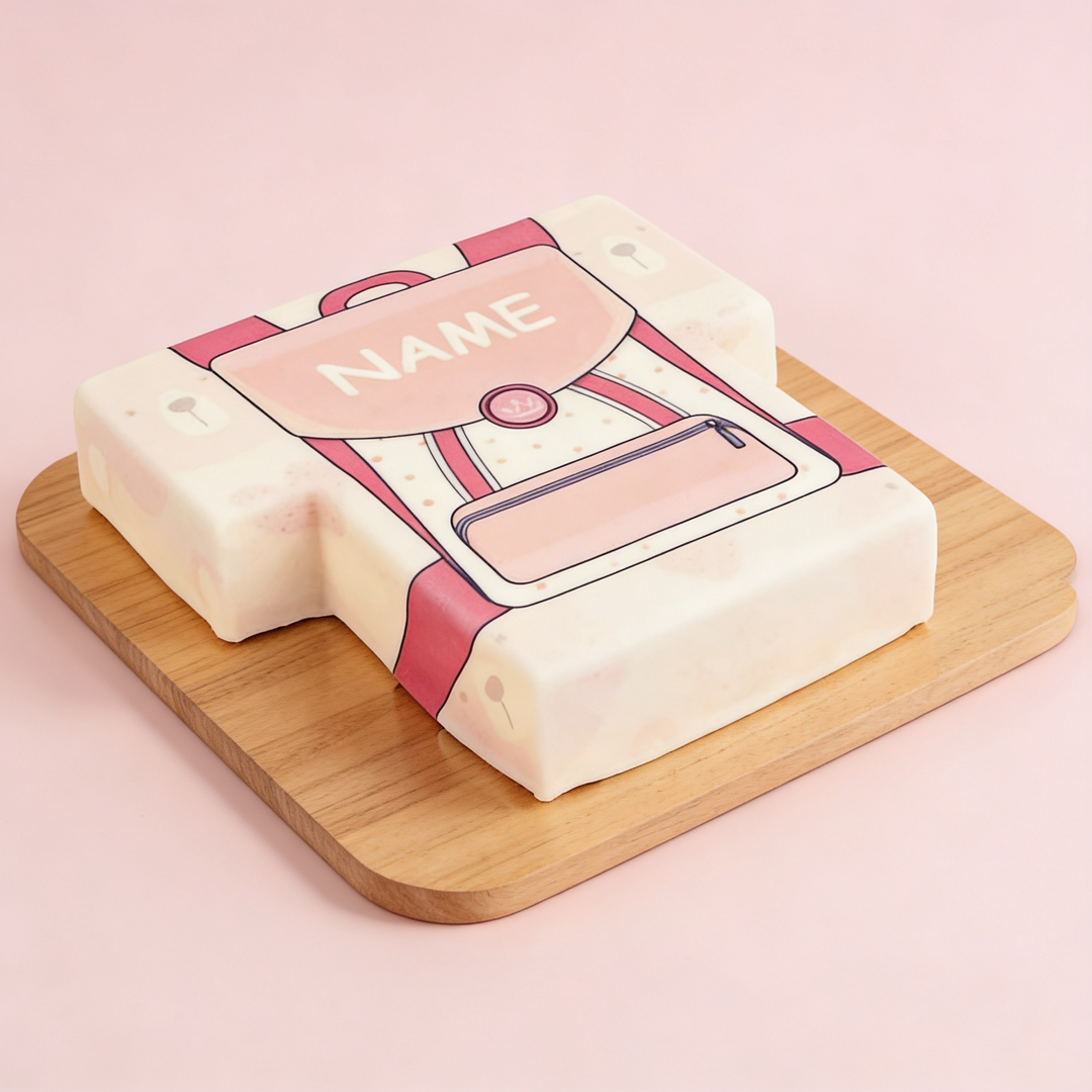 Gâteau sac d'école rose