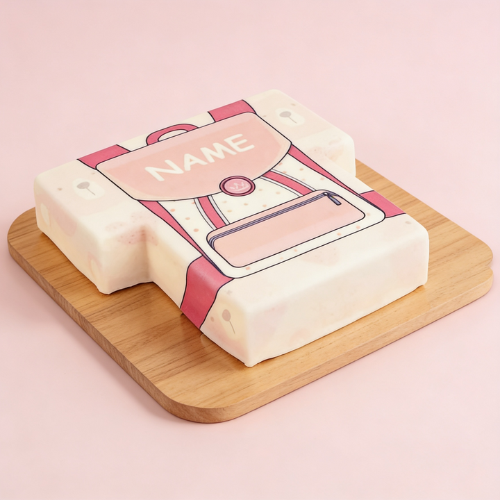 Gâteau sac d'école rose